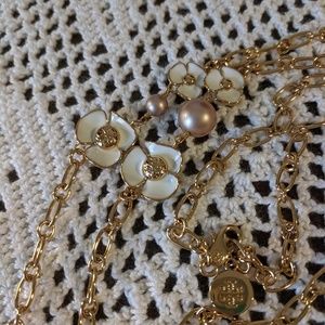 Tory Burch 21" floral chain with champagne pearls.
